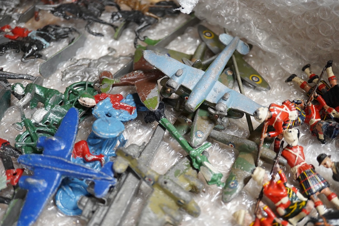 A collection of lead soldiers by Britains, etc. including Scottish Highlanders, together with a number of diecast military aircraft and a boxed Schuco Telesteering Car 3000